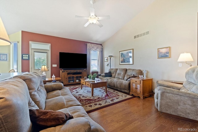 12522 Locust Way, Thornton, CO 80602 - living room with wood finished floors, a ceiling fan, and high vaulted ceiling