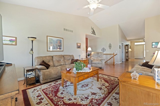 12522 Locust Way, Thornton, CO 80602 - living area with wood finished floors, high vaulted ceiling, and ceiling fan