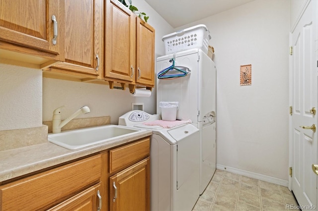12522 Locust Way, Thornton, CO 80602 - laundry room with cabinet space and washer and clothes dryer
