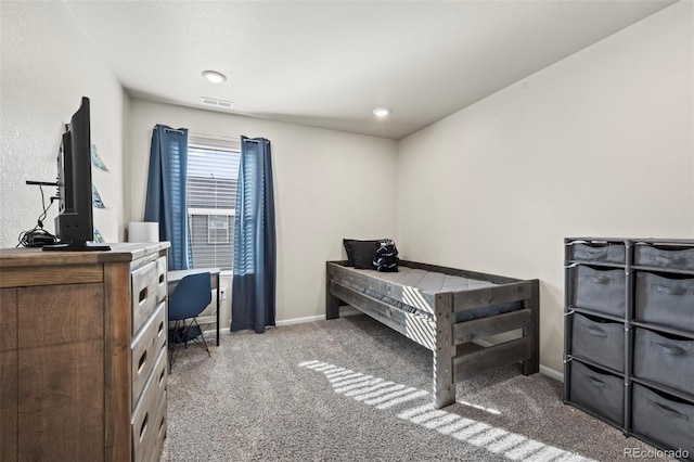 bedroom featuring baseboards, visible vents, and carpet floors