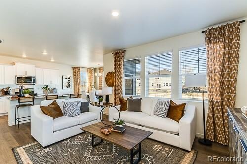 living room featuring dark wood-type flooring