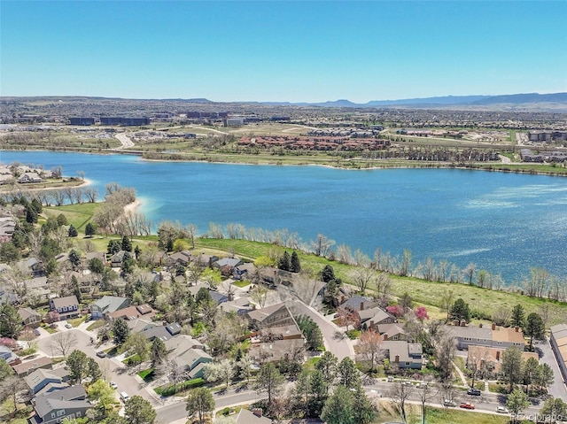 bird's eye view featuring a water and mountain view and a residential view