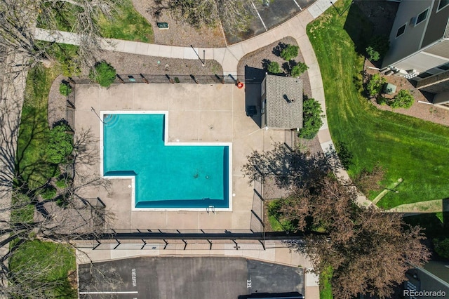 drone / aerial view of a pool