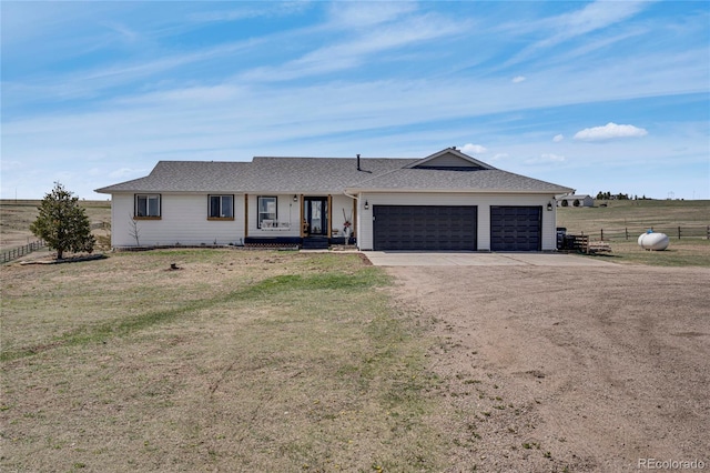 single story home with a front lawn, a shingled roof, dirt driveway, an attached garage, and fence