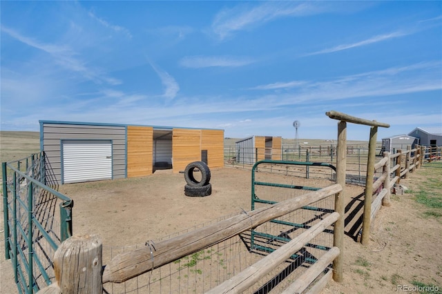 view of yard featuring an exterior structure and an outbuilding