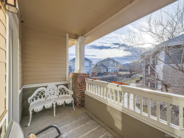 balcony featuring a residential view