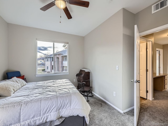 carpeted bedroom with baseboards, visible vents, and ceiling fan