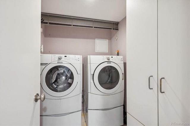 laundry room with washer and dryer