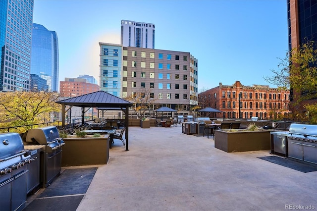 view of patio / terrace with a gazebo, area for grilling, and grilling area