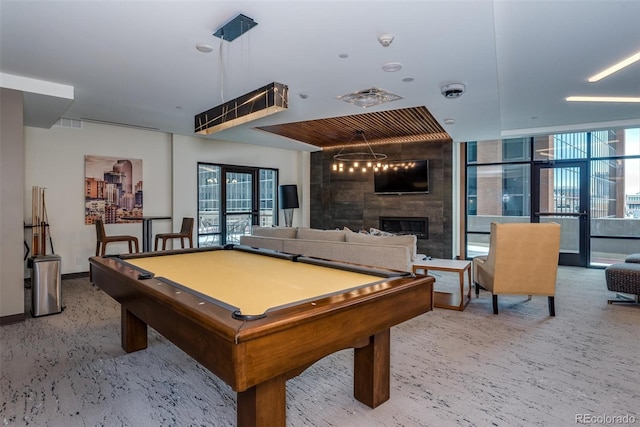 game room featuring light carpet, a fireplace, and billiards