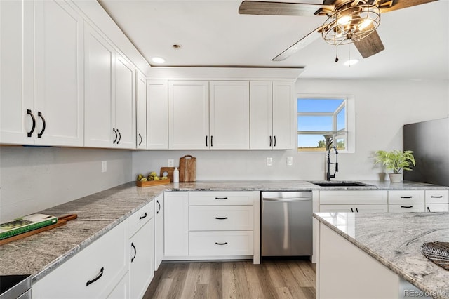 1134 Buffalo Run Rd, Calhan, CO 80808 - kitchen featuring dishwasher, a sink, recessed lighting, a ceiling fan, and white cabinetry