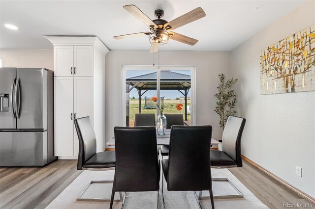 1134 Buffalo Run Rd, Calhan, CO 80808 - dining area featuring light wood-type flooring, ceiling fan, recessed lighting, and baseboards