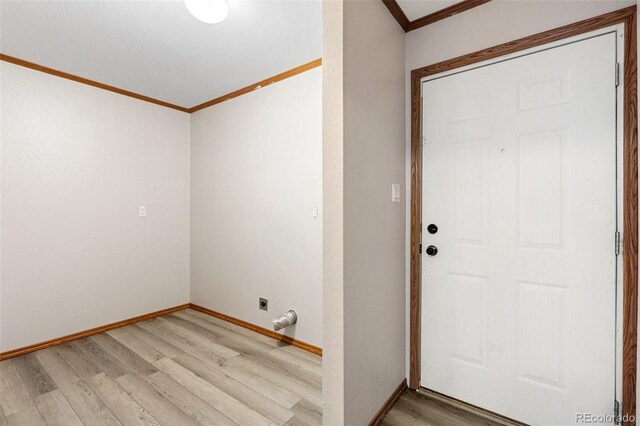 1134 Buffalo Run Rd, Calhan, CO 80808 - foyer with crown molding, light wood-type flooring, and baseboards