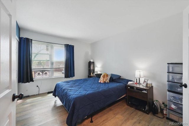 4058 Baytown Dr, Colorado Springs, CO 80916 - bedroom featuring wood finished floors