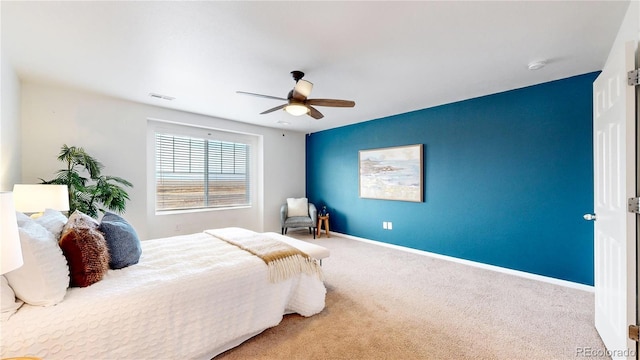 bedroom with ceiling fan and carpet