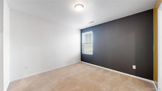 view of carpeted spare room