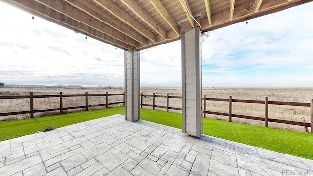 view of patio with a rural view