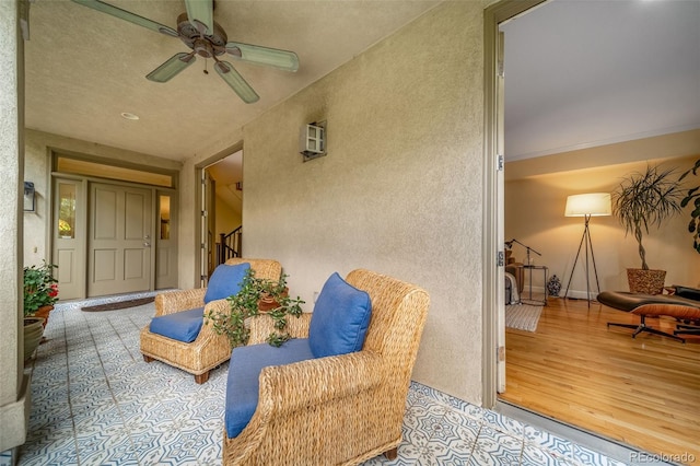 581 Garfield St, Denver, CO 80206 - property entrance featuring ceiling fan and stucco siding