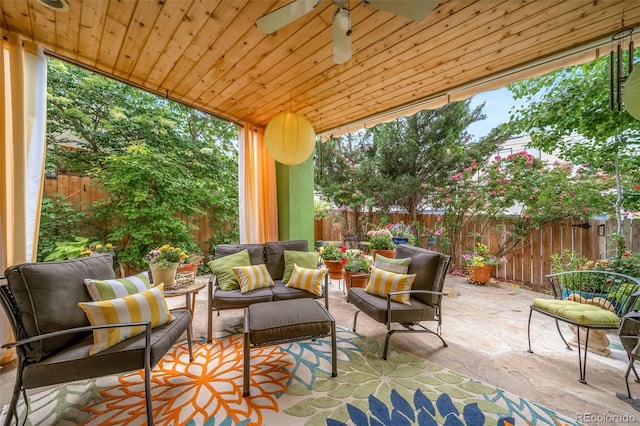 581 Garfield St, Denver, CO 80206 - fenced backyard featuring a patio area, outdoor lounge area, and ceiling fan