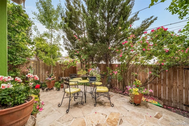581 Garfield St, Denver, CO 80206 - fenced backyard with a patio and outdoor dining area