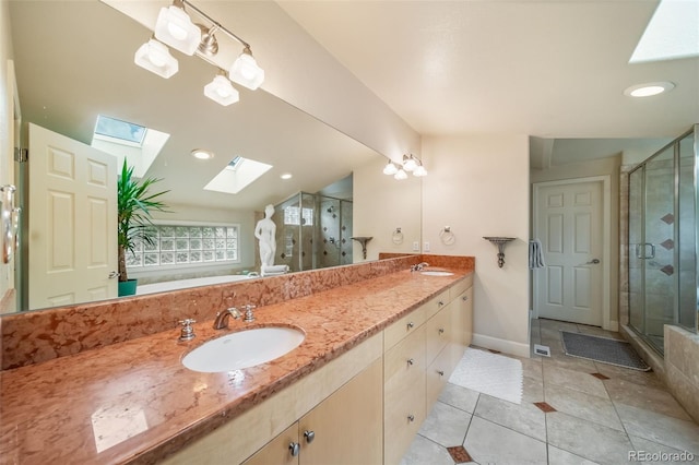 581 Garfield St, Denver, CO 80206 - bathroom with a skylight, a stall shower, tile patterned floors, and double vanity