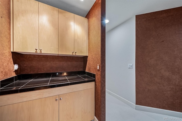 581 Garfield St, Denver, CO 80206 - kitchen featuring light brown cabinets and tile counters