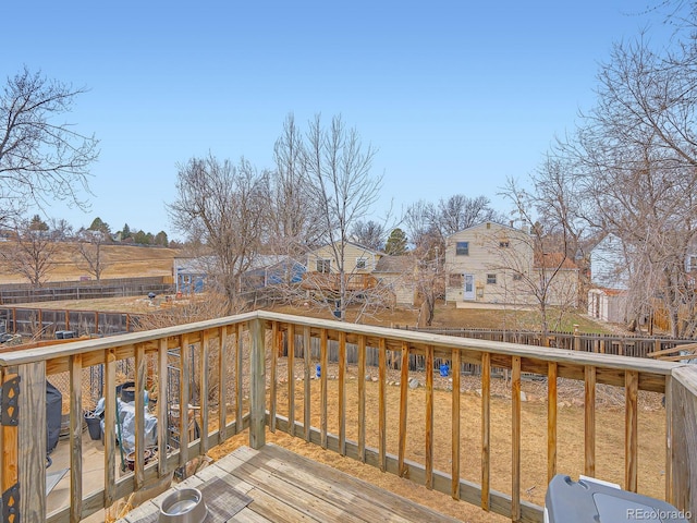 wooden deck featuring a residential view