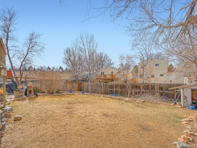 view of yard with a fenced backyard