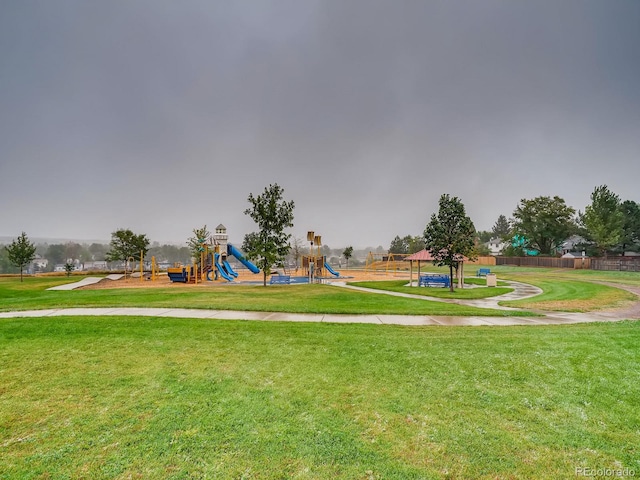 community playground featuring a lawn