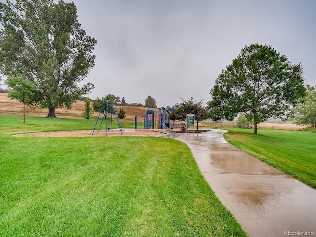 community play area with a yard