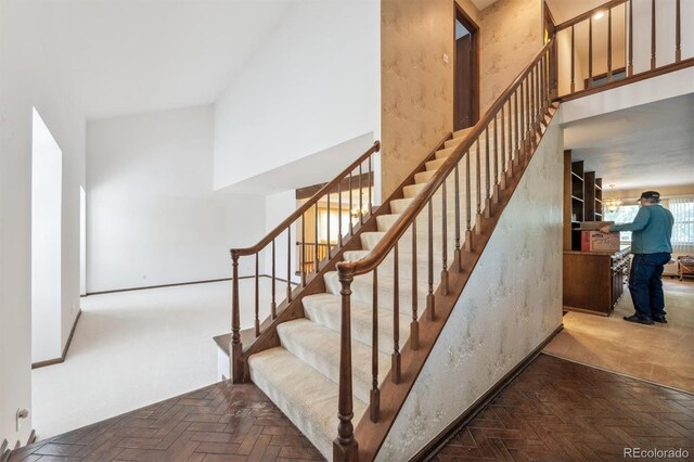 4855 S Joplin St, Aurora, CO 80015 - stairway featuring a high ceiling