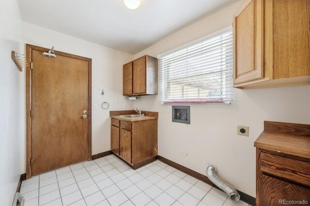 4855 S Joplin St, Aurora, CO 80015 - laundry room featuring electric dryer hookup, cabinet space, hookup for a washing machine, and baseboards