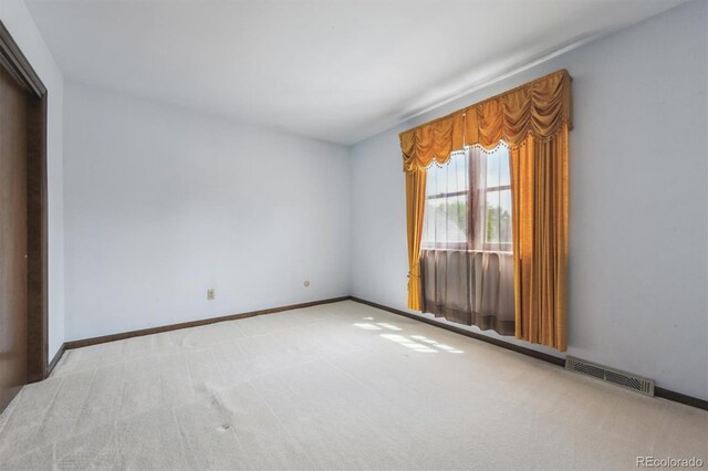 4855 S Joplin St, Aurora, CO 80015 - unfurnished room with carpet flooring and baseboards