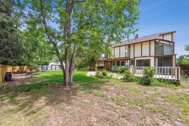 4855 S Joplin St, Aurora, CO 80015 - view of yard with a wooden deck