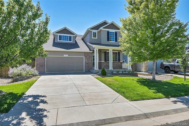 craftsman house featuring a porch, concrete driveway, an attached garage, a front yard, and brick siding