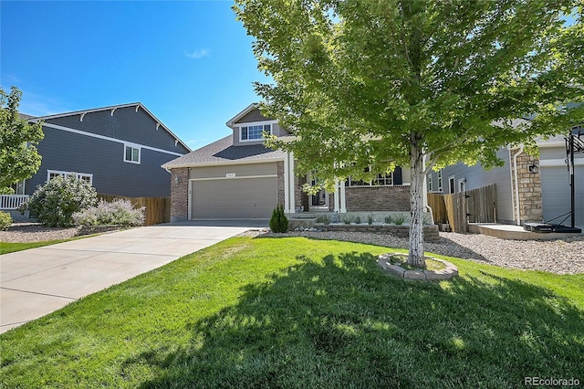 view of front facade with brick siding, fence, driveway, and a front lawn