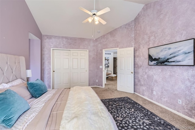 carpeted bedroom featuring ceiling fan, high vaulted ceiling, and a closet