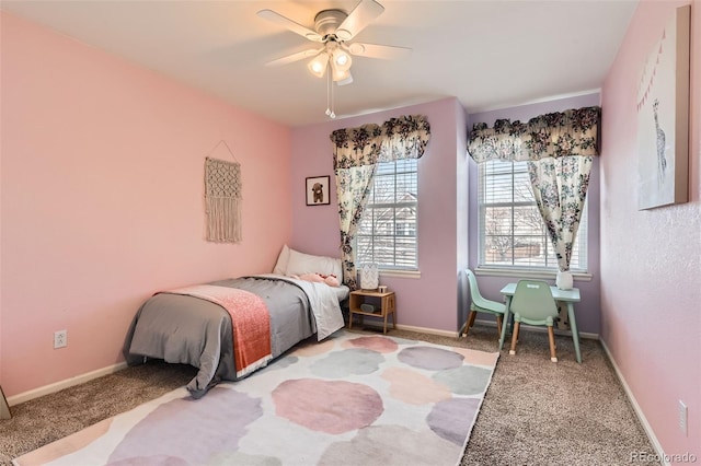 bedroom with ceiling fan and carpet flooring