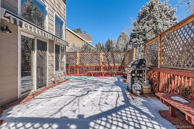 wooden deck with grilling area