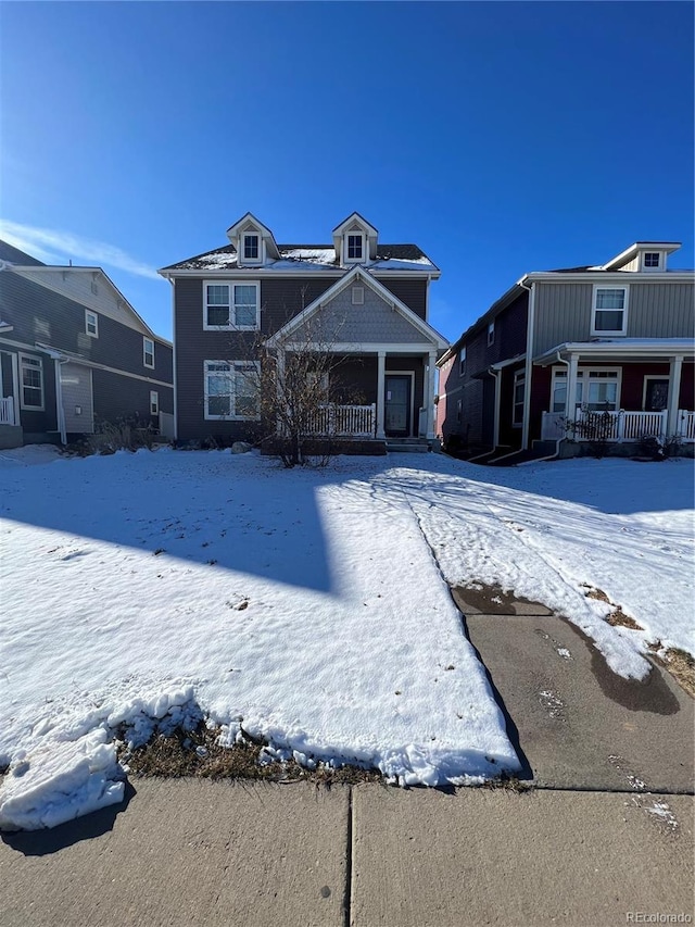 view of front of property featuring covered porch