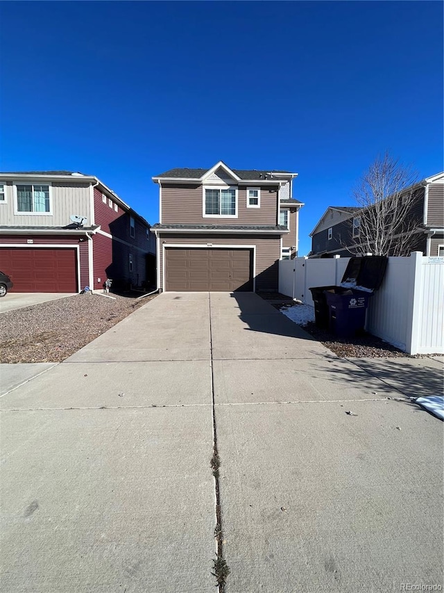 view of front of property featuring a garage