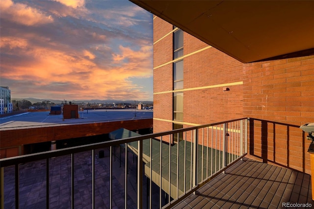 view of balcony at dusk