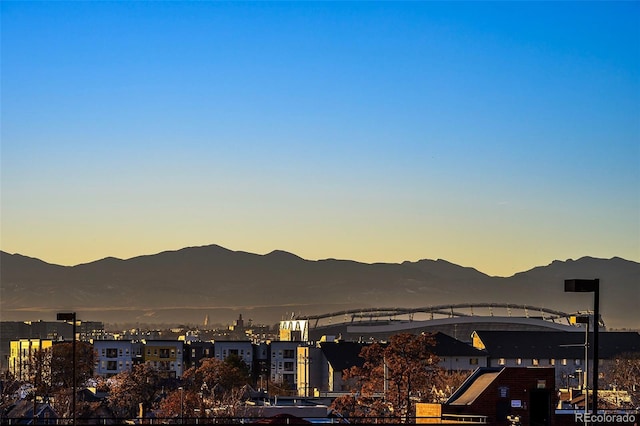 view of mountain feature featuring a view of city