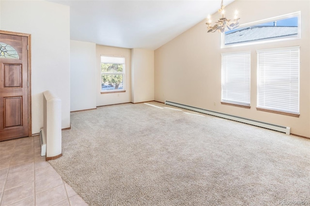 unfurnished living room featuring baseboard heating, a chandelier, light tile patterned floors, and lofted ceiling