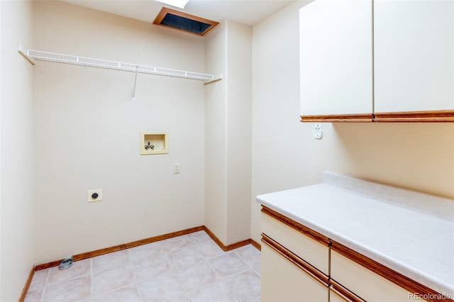 laundry area with cabinets, washer hookup, and electric dryer hookup