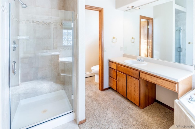 bathroom featuring toilet, walk in shower, and vanity