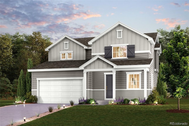 view of front of house with driveway, board and batten siding, an attached garage, and a lawn