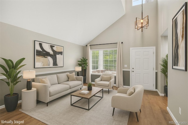 4535 Hunterwood Dr, Highlands Ranch, CO 80130 - living room with high vaulted ceiling and wood finished floors
