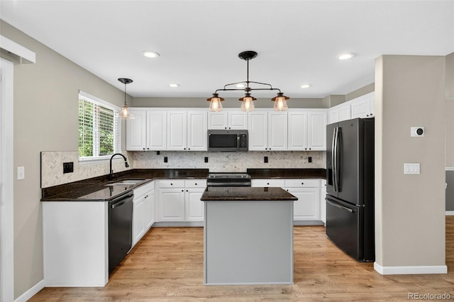 4535 Hunterwood Dr, Highlands Ranch, CO 80130 - kitchen featuring black appliances, white cabinetry, a kitchen island, backsplash, and recessed lighting