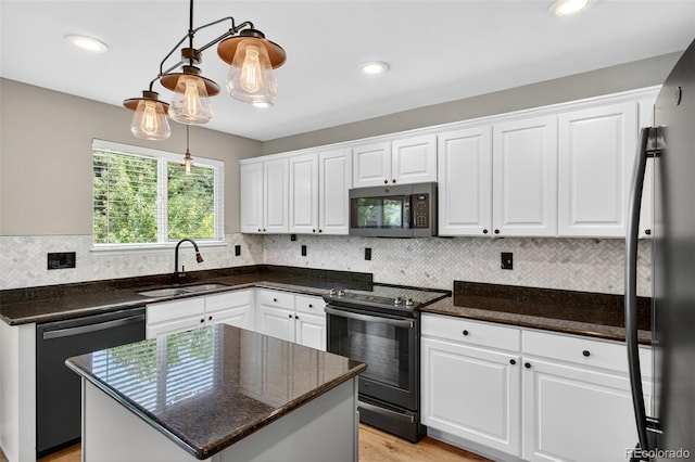 4535 Hunterwood Dr, Highlands Ranch, CO 80130 - kitchen featuring appliances with stainless steel finishes, white cabinets, and recessed lighting